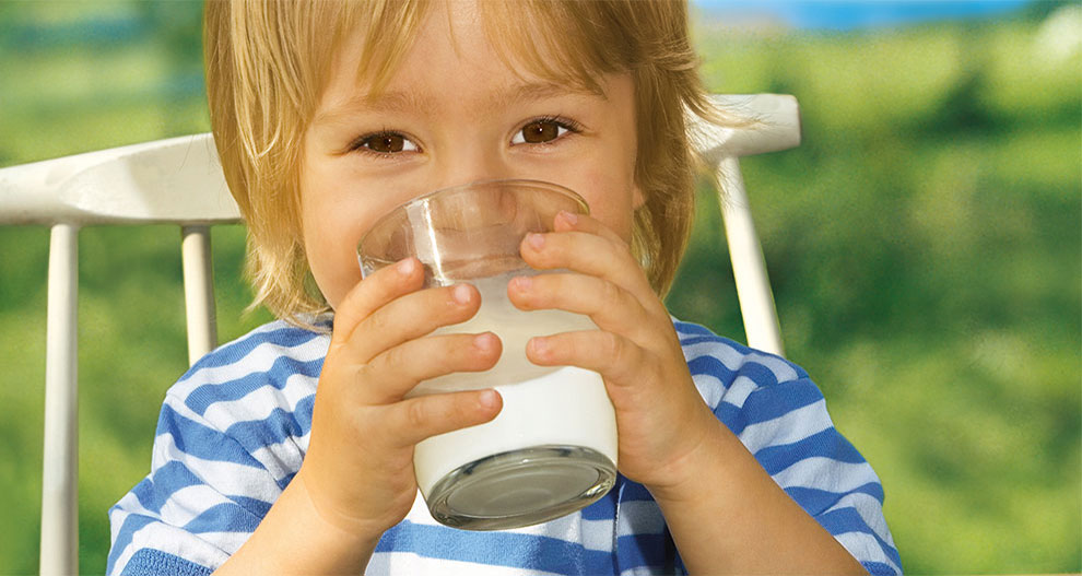 Child drinking milk.